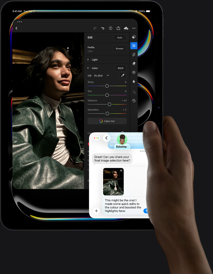 iPad Pro, front exterior, portrait orientation, space black colour, right hand holding device, display showing photo editing app with image of a person in a leather jacket, editing tools and sliders, iMessage conversation happening between user and another individual reviewing the photo