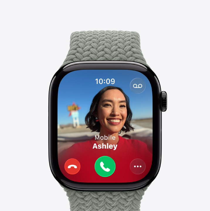 Apple Watch Series 11, titanium case, natural color, incoming call, contact photo, accept and decline call buttons, right side exterior, Digital Crown, Braided Solo Loop, forest color