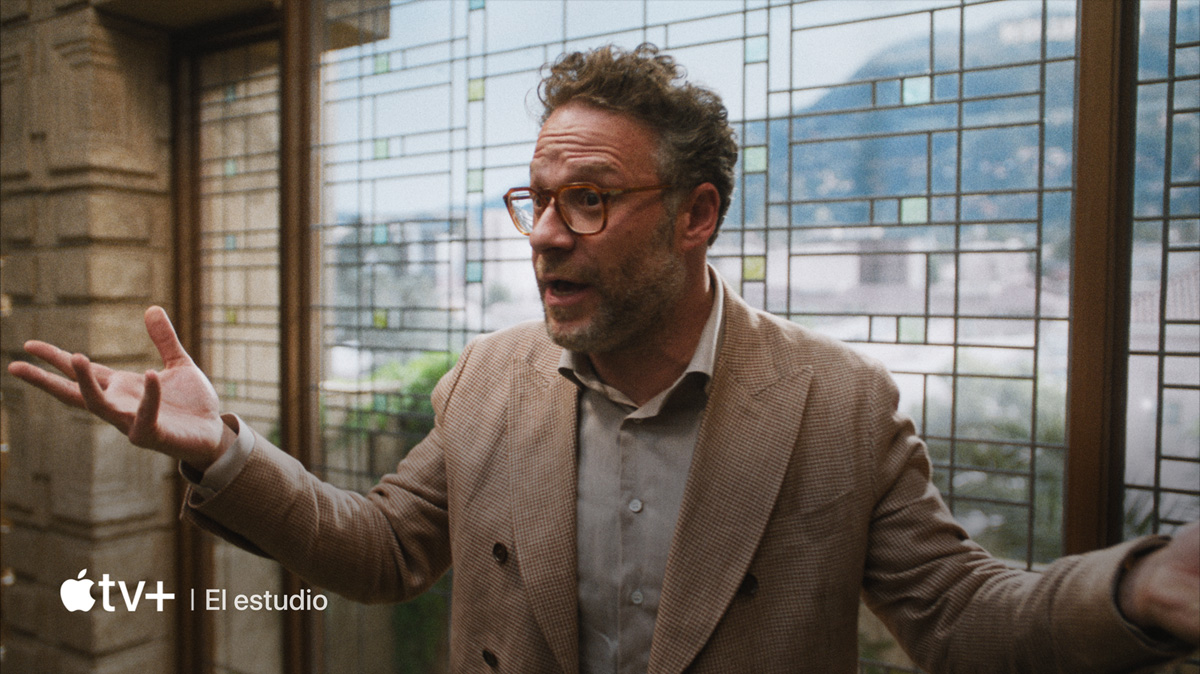 A flatscreen television showing a static image of "The Studio" available on Apple TV