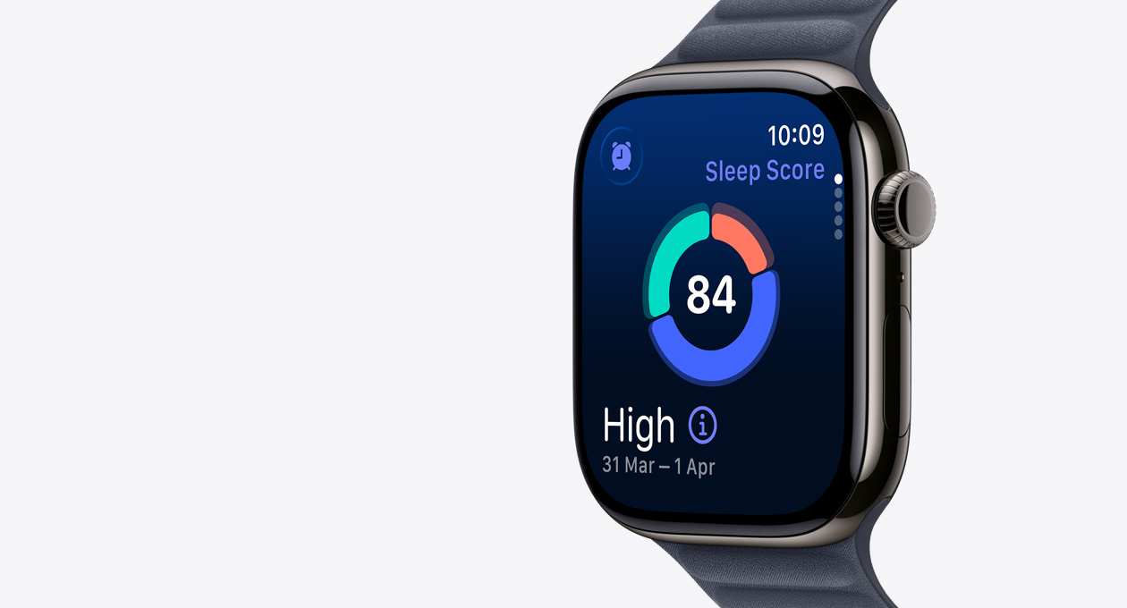 Apple Watch Series 11, slate colour, titanium case, screen shows sleep score circle graph, right side exterior, Digital Crown, band, navy Magnetic Link