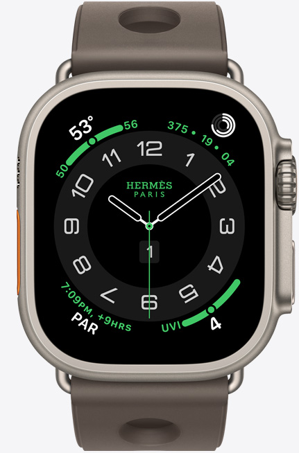 Apple Watch Hermès Ultra 3, Titangehäuse, Farbe Natur, Hermès Circulaire Zifferblatt, Komplikationen: Wetter, Aktivitätsringe, PAR, UV Index, Gehäuse rechts, Digital Crown, Mikrofon, erhöhte Seitentaste, Scub’H Diving Armband, Farbe Gris Titane