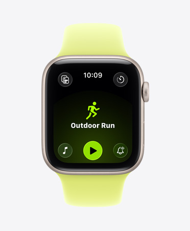 Apple Watch SE 3, kast van aluminium, kleur sterrenlicht, work-out Buiten Hardlopen geopend, Apple Music-afspeelregelaars onder in het scherm, sportbandje, kleur neongeel