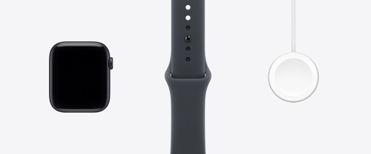 Apple Watch SE 3, ภายนอกด้านหน้า, จอภาพแบบขอบจรดขอบ, สายแบบ Sport Band สีมิดไนท์, สายชาร์จเร็วแบบแม่เหล็กเป็น USB-C สำหรับ Apple Watch