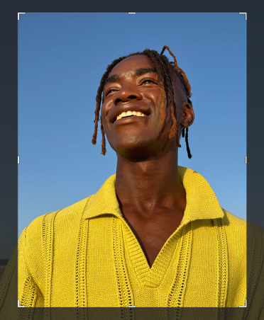 Photo of a man in a yellow shirt, cropping tool